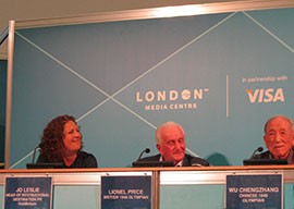 Lionel Price and Wu Chengzhang, basketball players from the London 1948 Olympic Games, sit on a panel at a press conference with Jo Leslie of Visit Britain on Sunday, August 4, 2012.